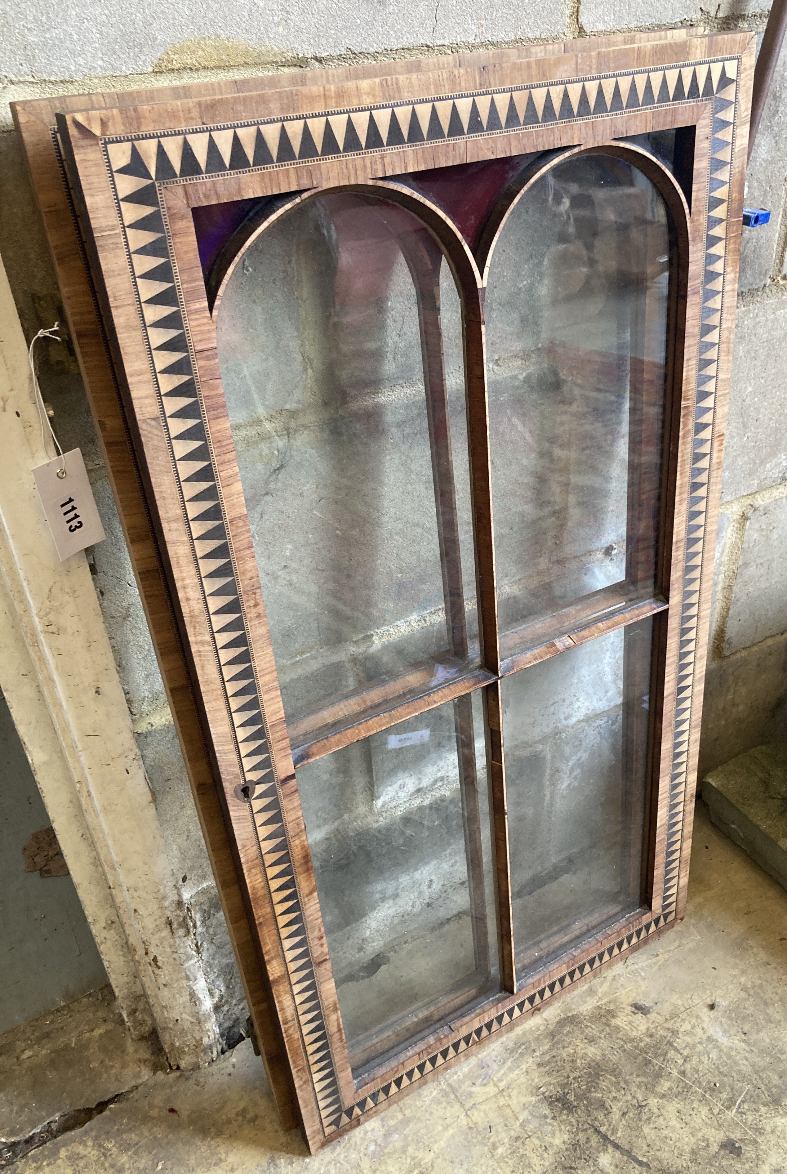 A pair of Victorian inlaid part stained glass cabinet doors, each door width 49cm, height 92cm